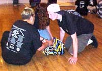 image of students with robot